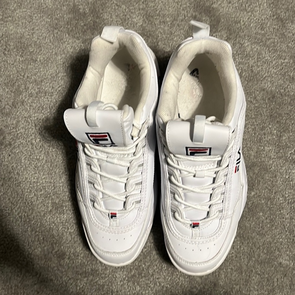 White Fila disrupter shoes without box. Minorly worn. No more than 10 times.